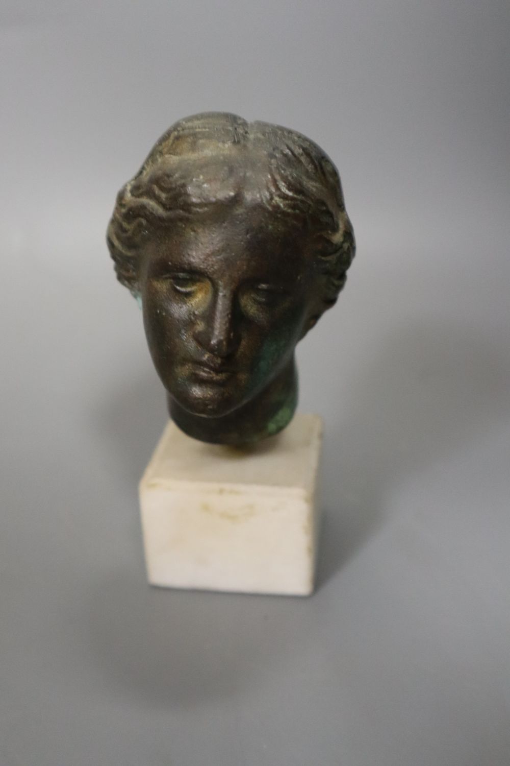 A pair of Regency two branch two light lustres, width 27cm, and a miniature bust